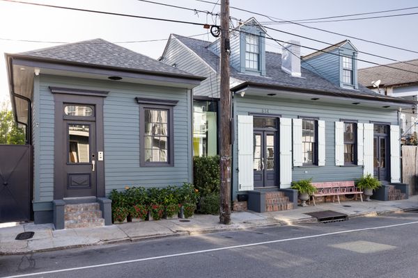 Mason Ros led the design of a 48-foot glass hallway that connects two newly renovated homes in New Orleans.