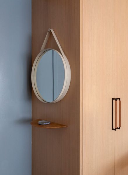 A wood shelf is the perfect spot to place a pair of keys.