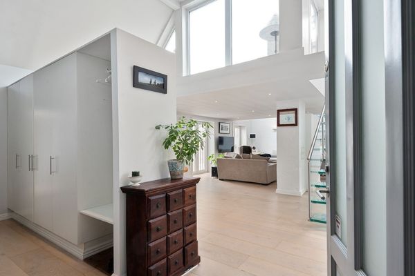 The apartment had originally been designed by investors and had a very corporate feel.