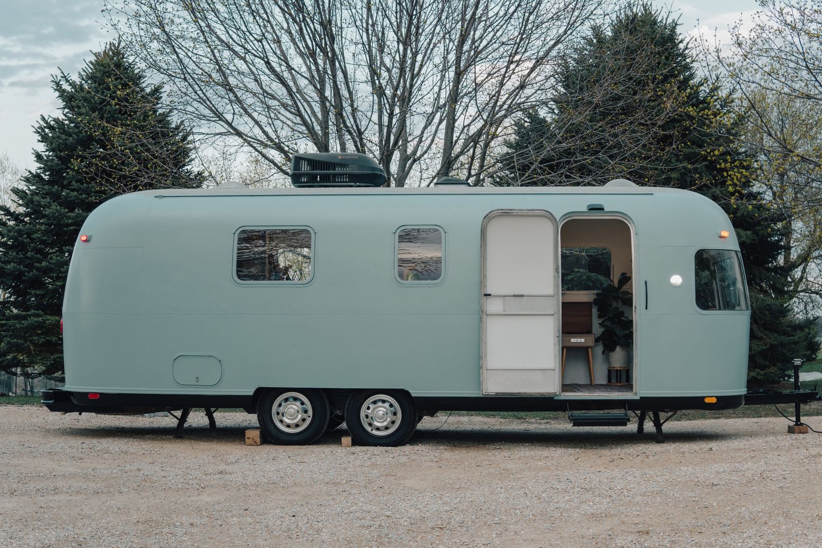 The current owners gutted the 1974 camper and gave it an open floor plan, a Japanese-style tub, and a powder-blue shell.