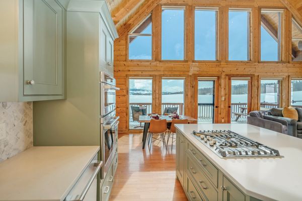 The kitchen has been renovated with custom cabinetry and quartz countertops.
